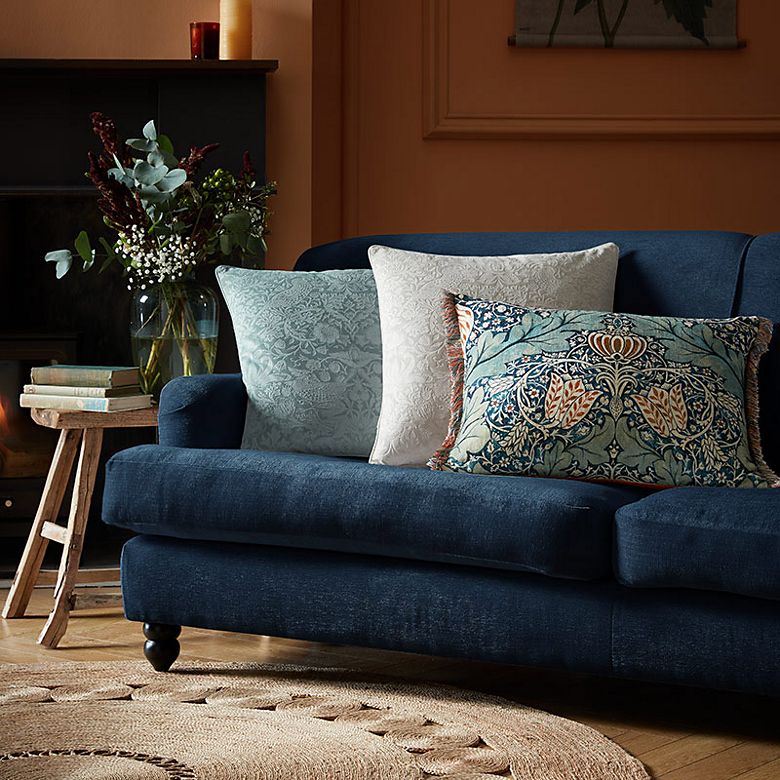 Cushions on blue sofa hotsell