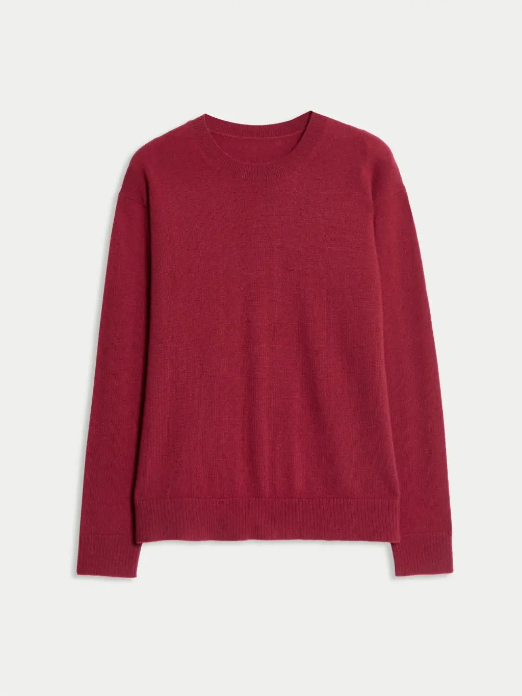 A cutout of a burgundy cashmere crew neck jumper by M&S