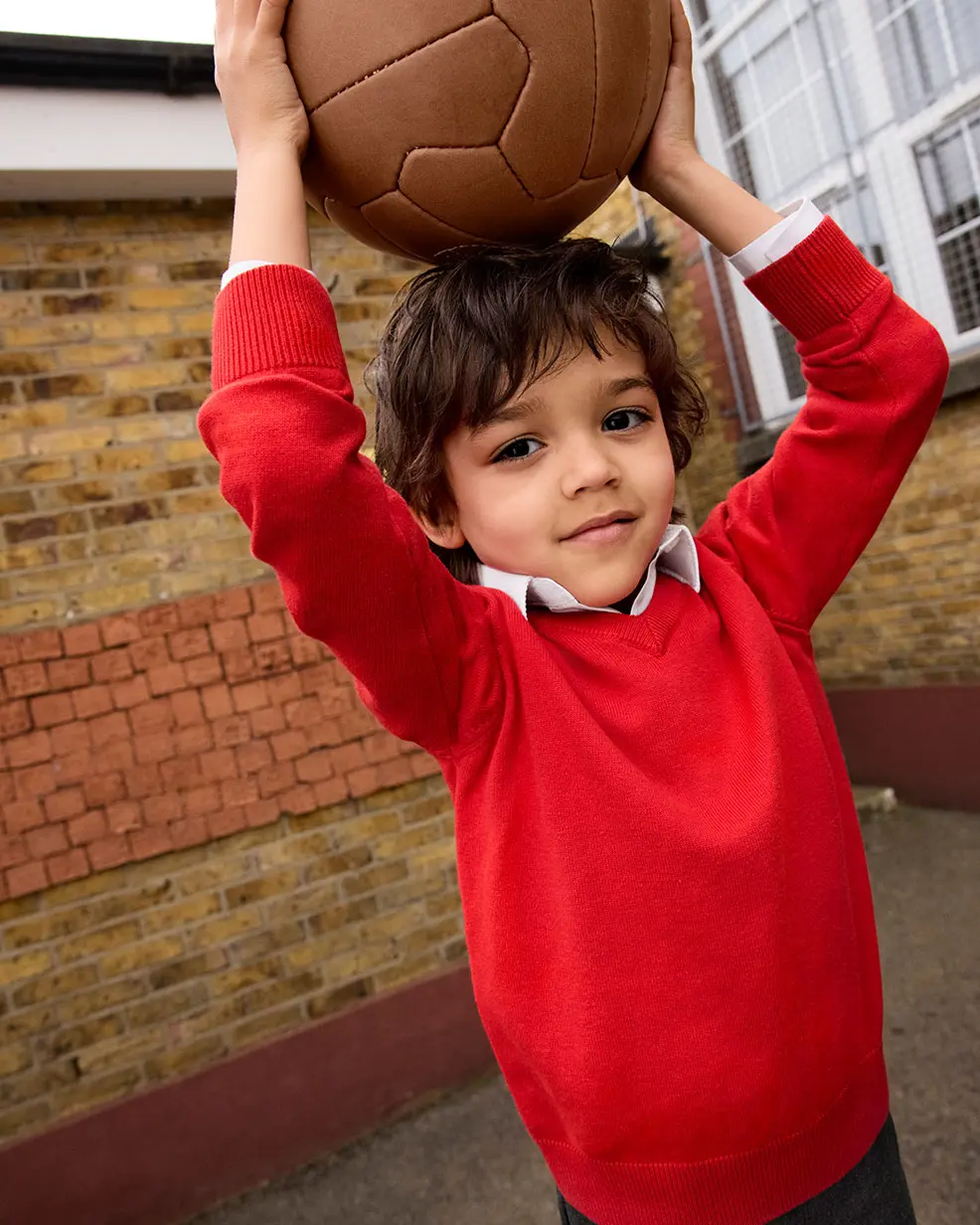 Boy wearing M&S winter school uniform