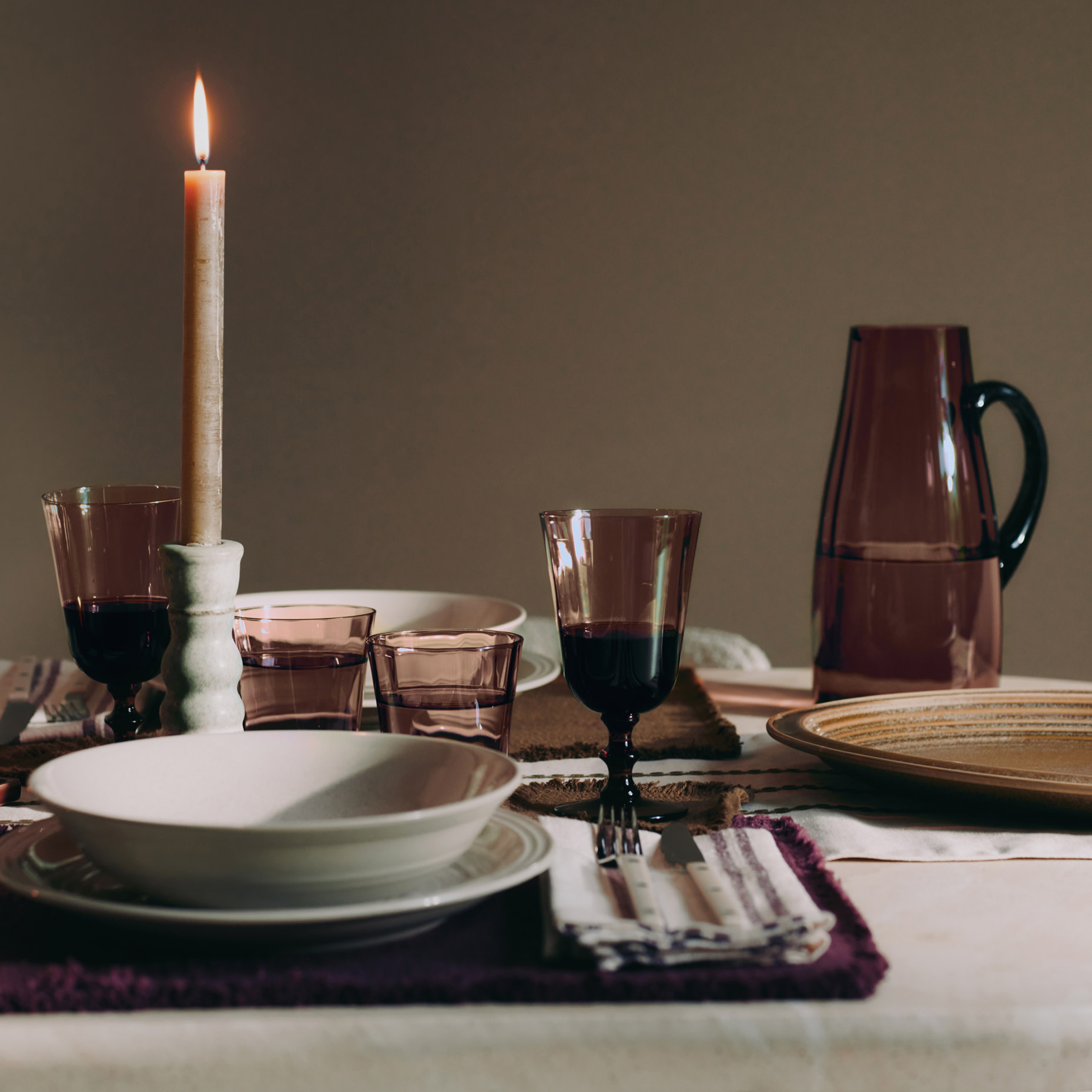 Table with candle and plates