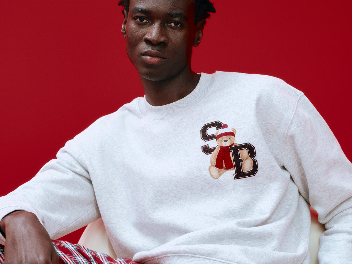 Man wearing Christmas pyjamas