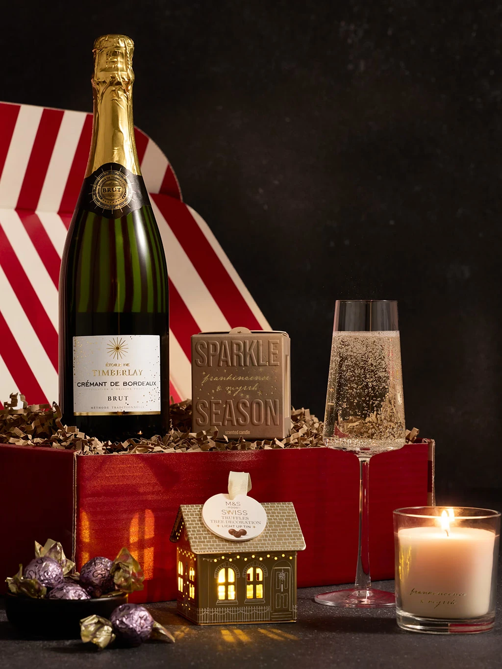 M&S Christmas hamper with champagne, candles and chocolates.