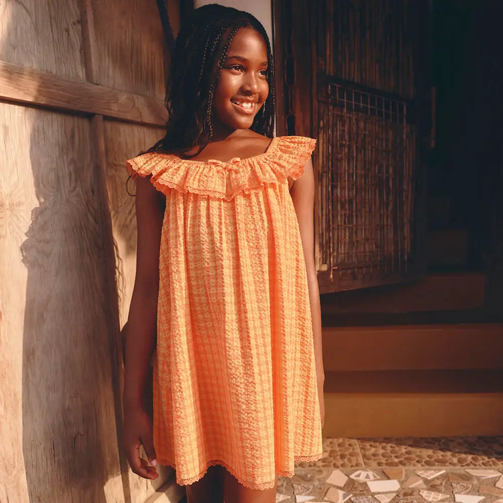 Girl in orange dress