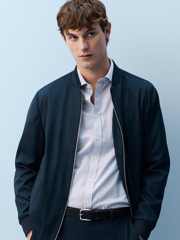 Man wearing navy jacket