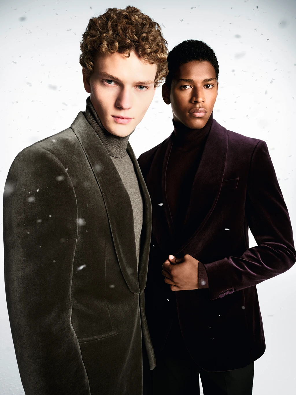 Two men wearing velvet blazers