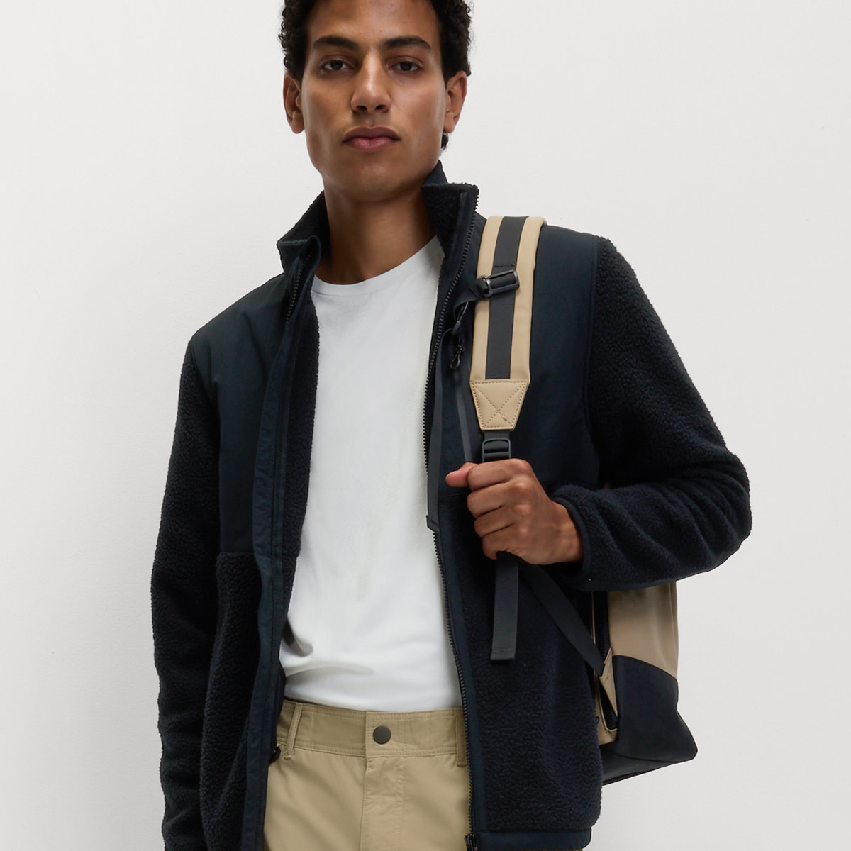 Man wearing navy shirt