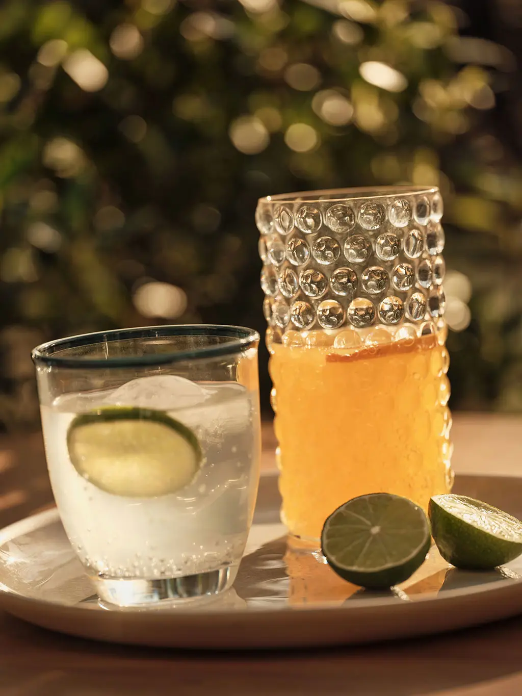 Picnic glasses with lime on a picnic plate