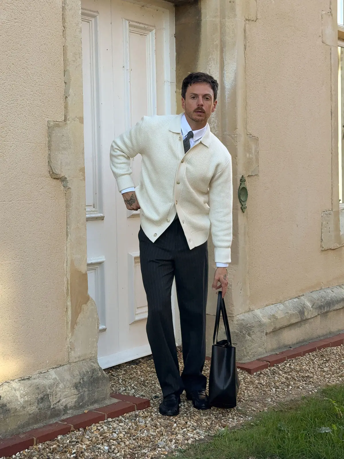 Influencer Nick Howard-Lanes wearing smart-casual pieces 