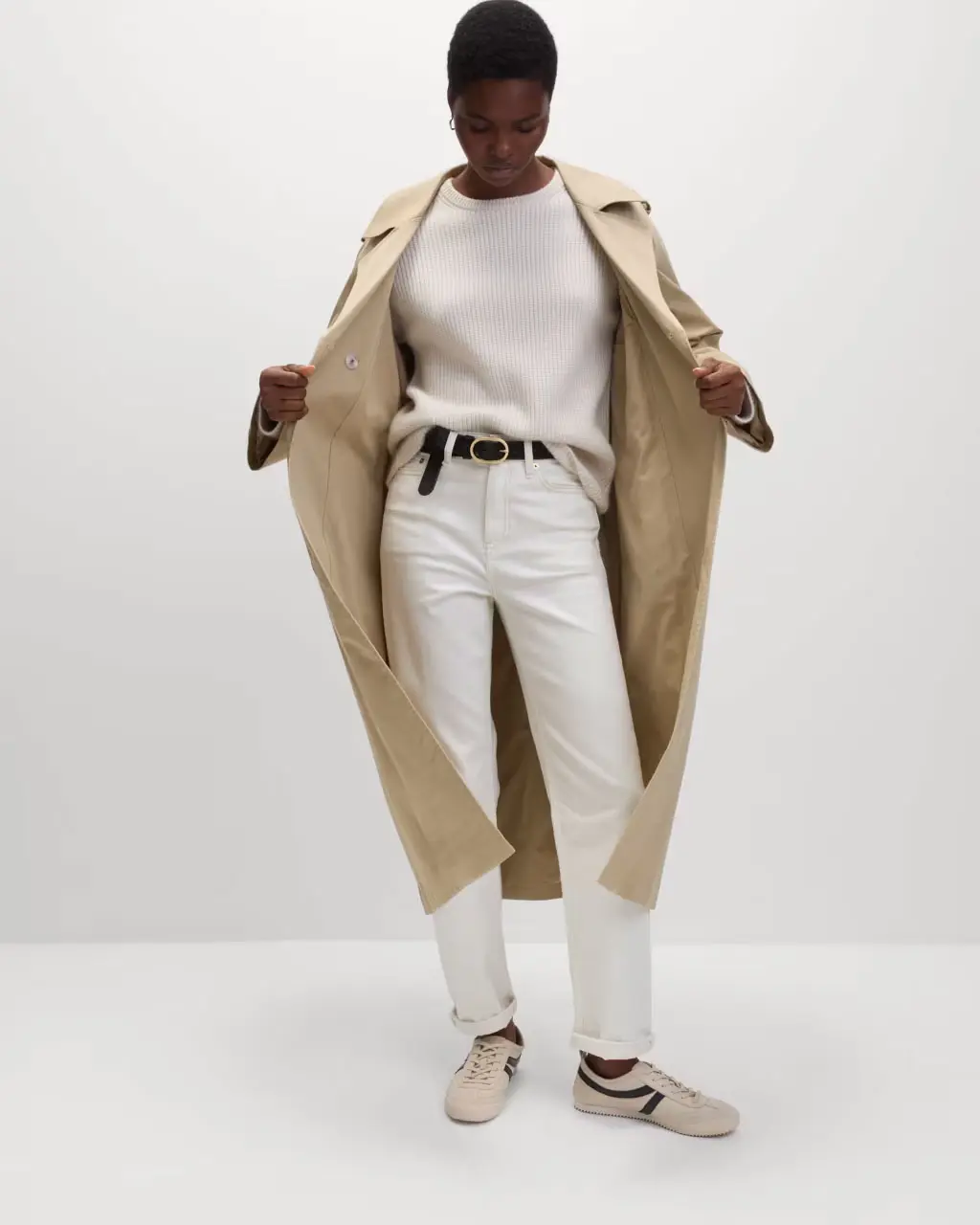 Woman wearing a trench coat at M&S