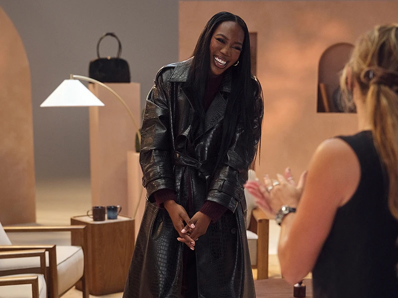 Celebrity stylist Melissa wearing a brown mock croc trench coat