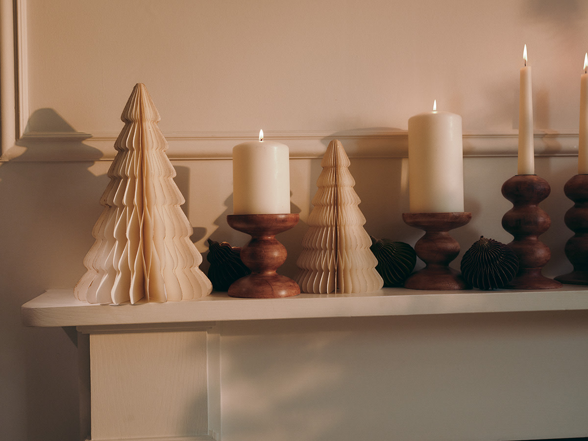 Candles and decorations on mantle