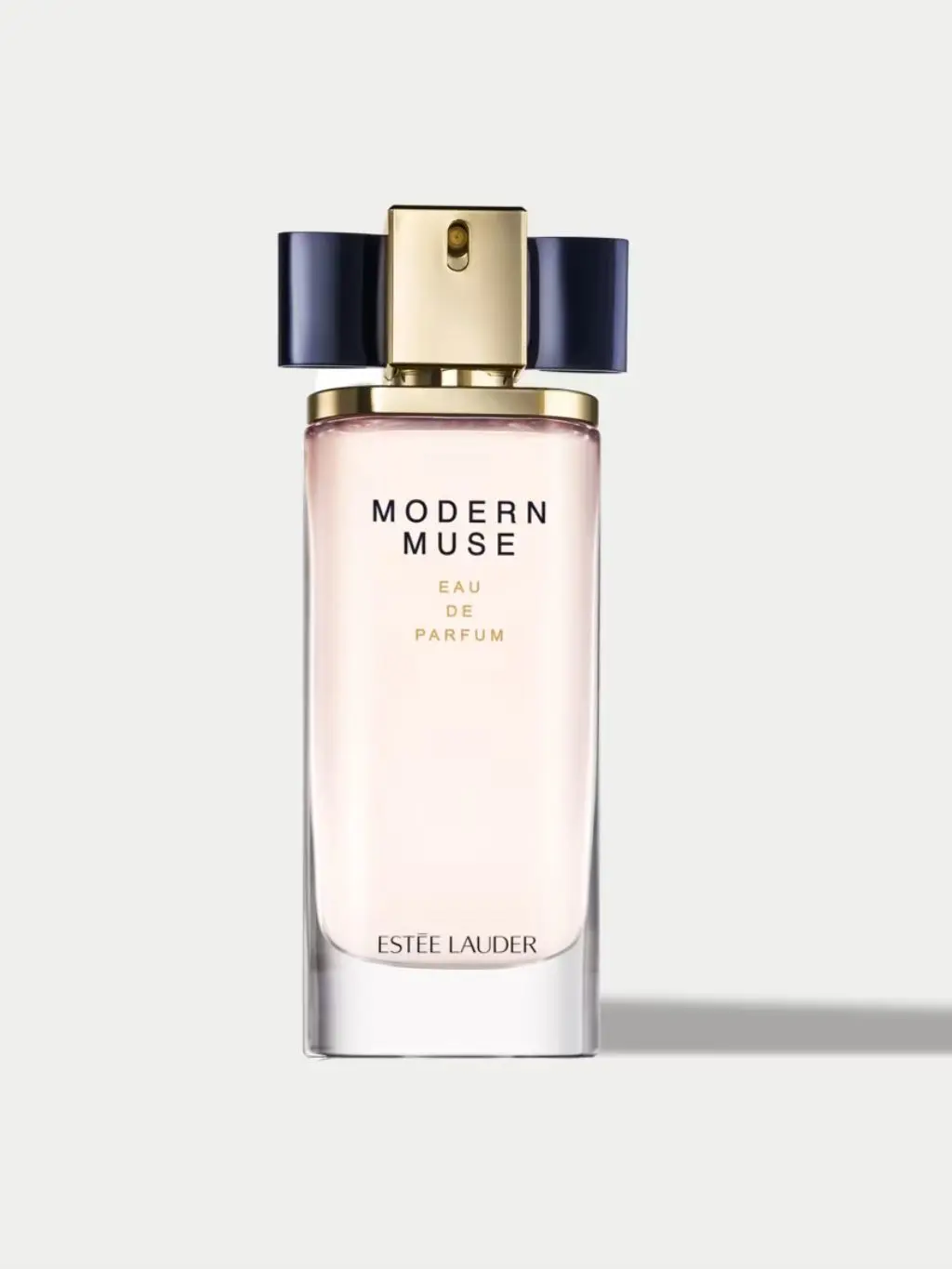A bottle of Modern Muse set against a light grey background