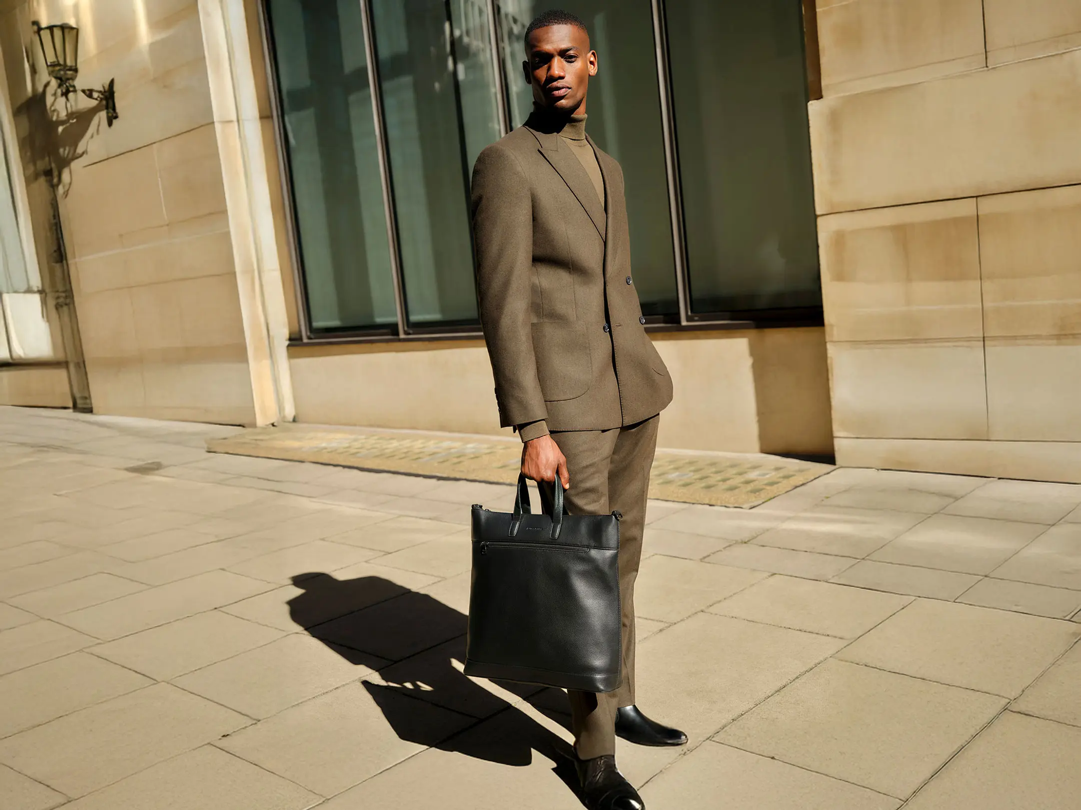 Man wearing suit by Autograph Performance