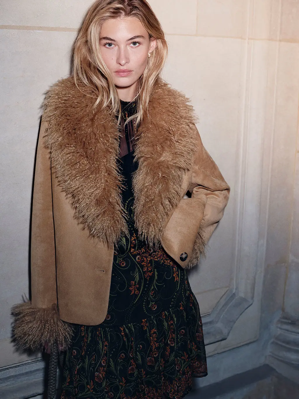 Woman in suede jacket