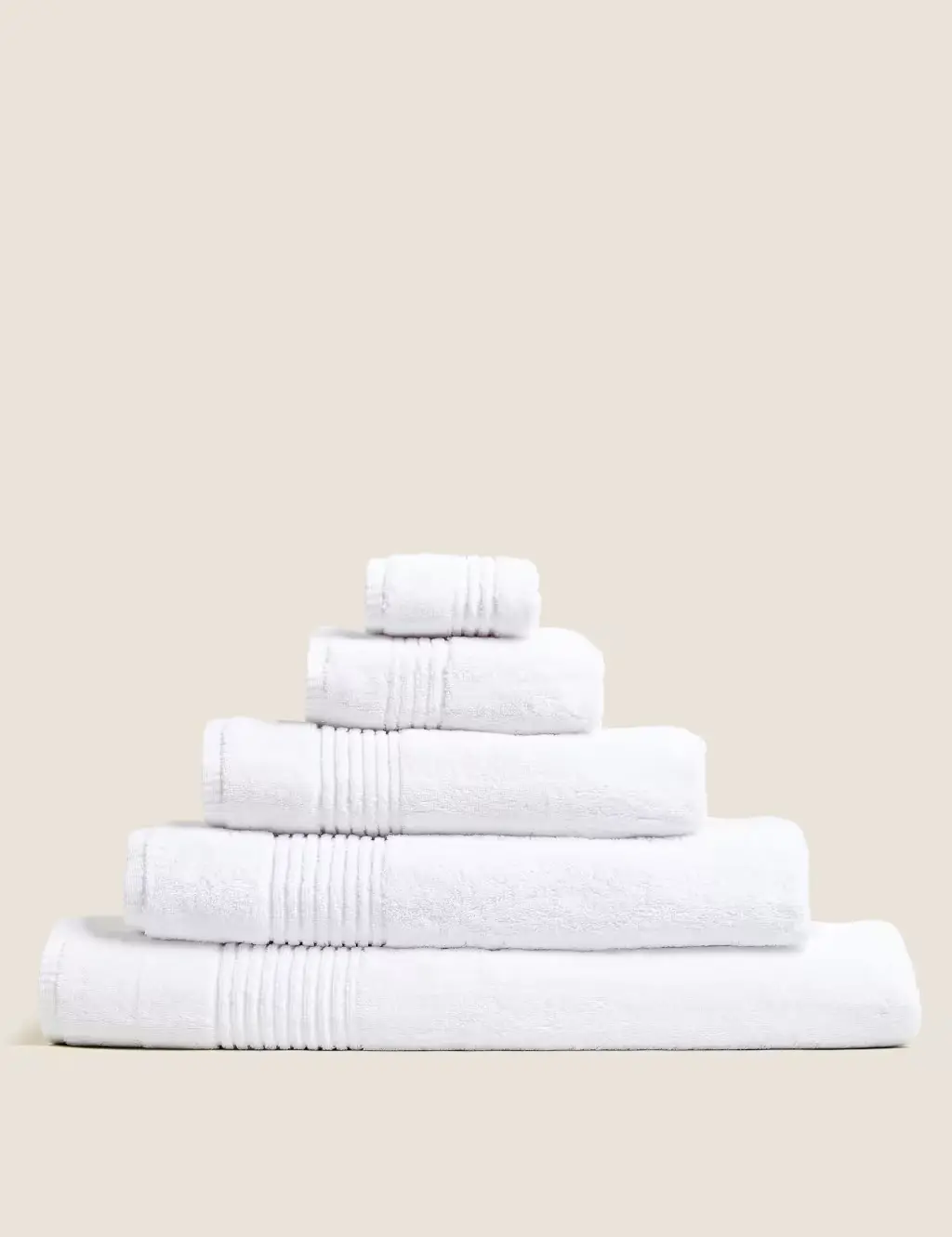 Folded white towels