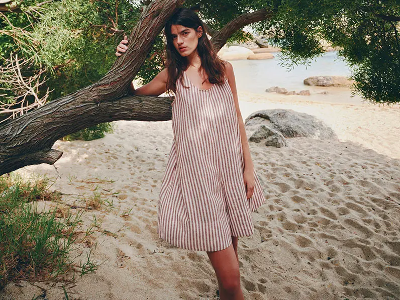 Woman in striped playsuit
