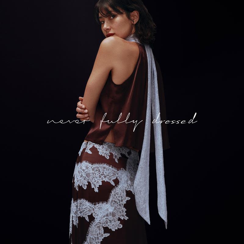 Woman wearing outfit by Never Fully Dressed