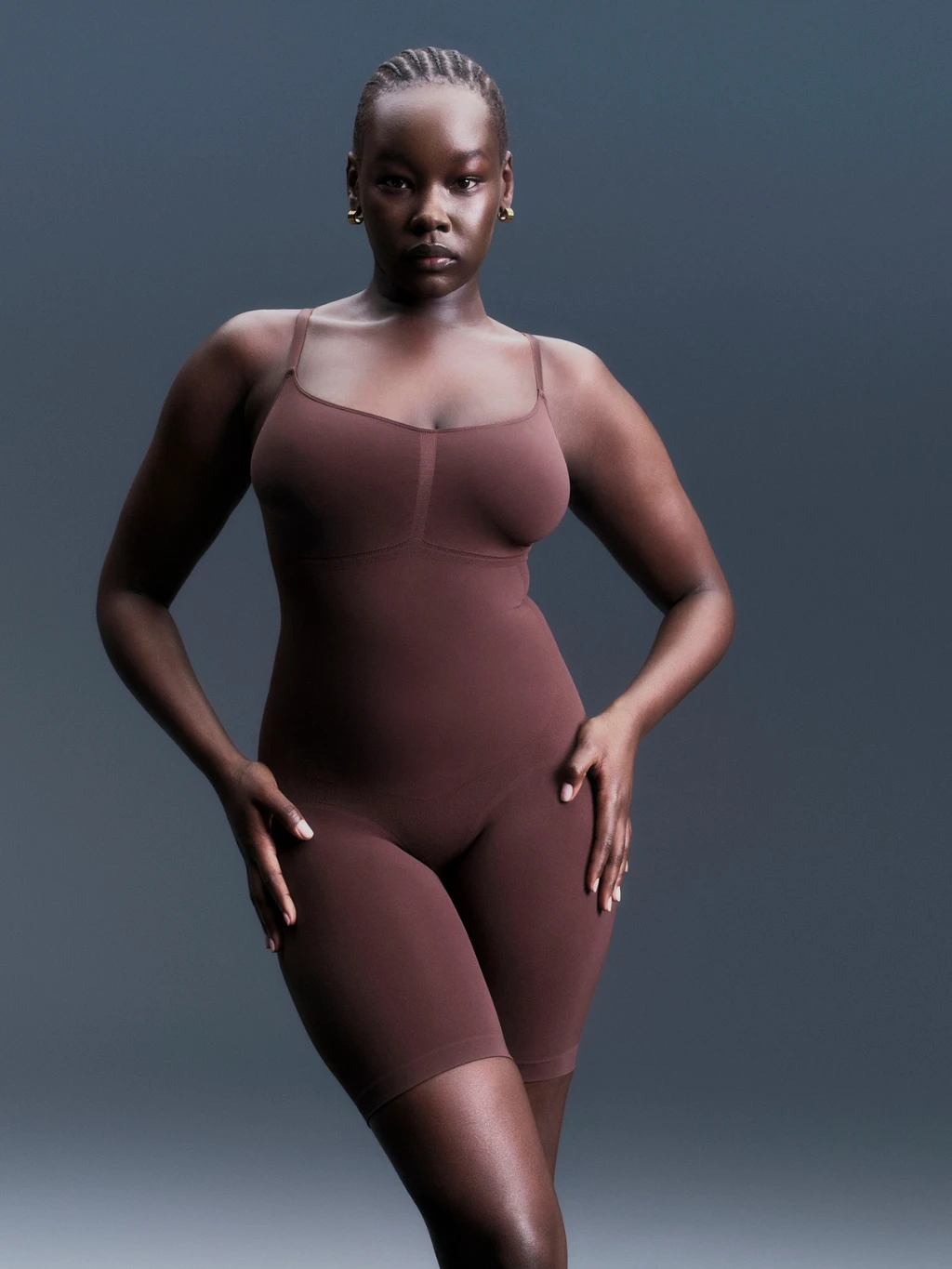 Woman wearing sculpting bridal bodysuit