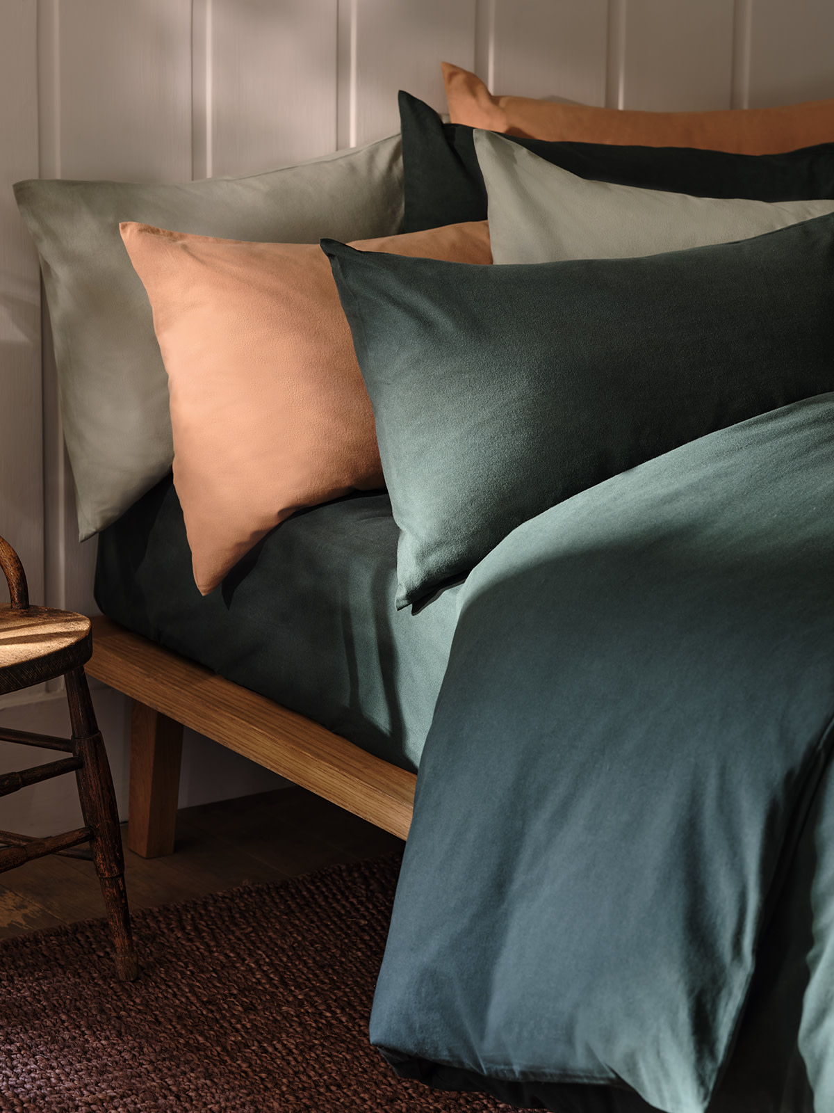 Cotton bedding on a bed