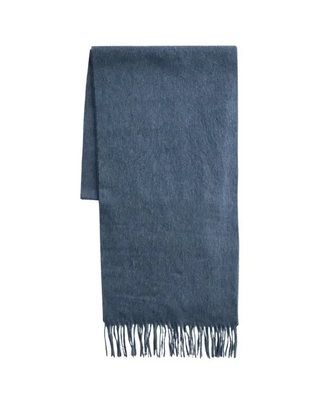 A product shot of a man's blue cashmere scarf