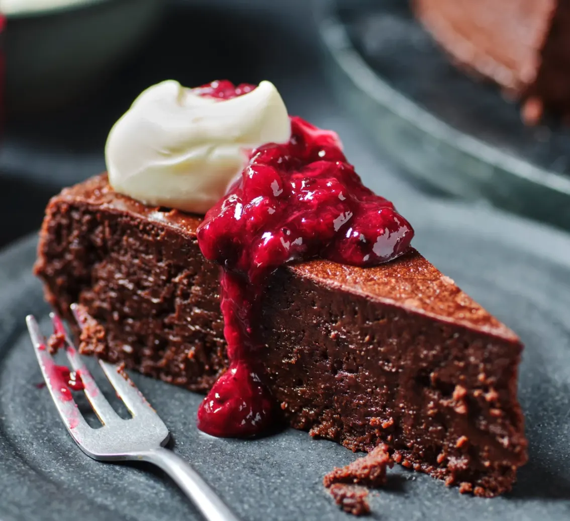 Flourless chocolate cake, fruit compote and creme fraîche