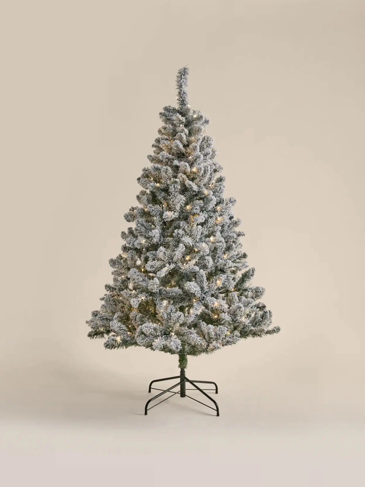 Image of snow-covered Christmas tree