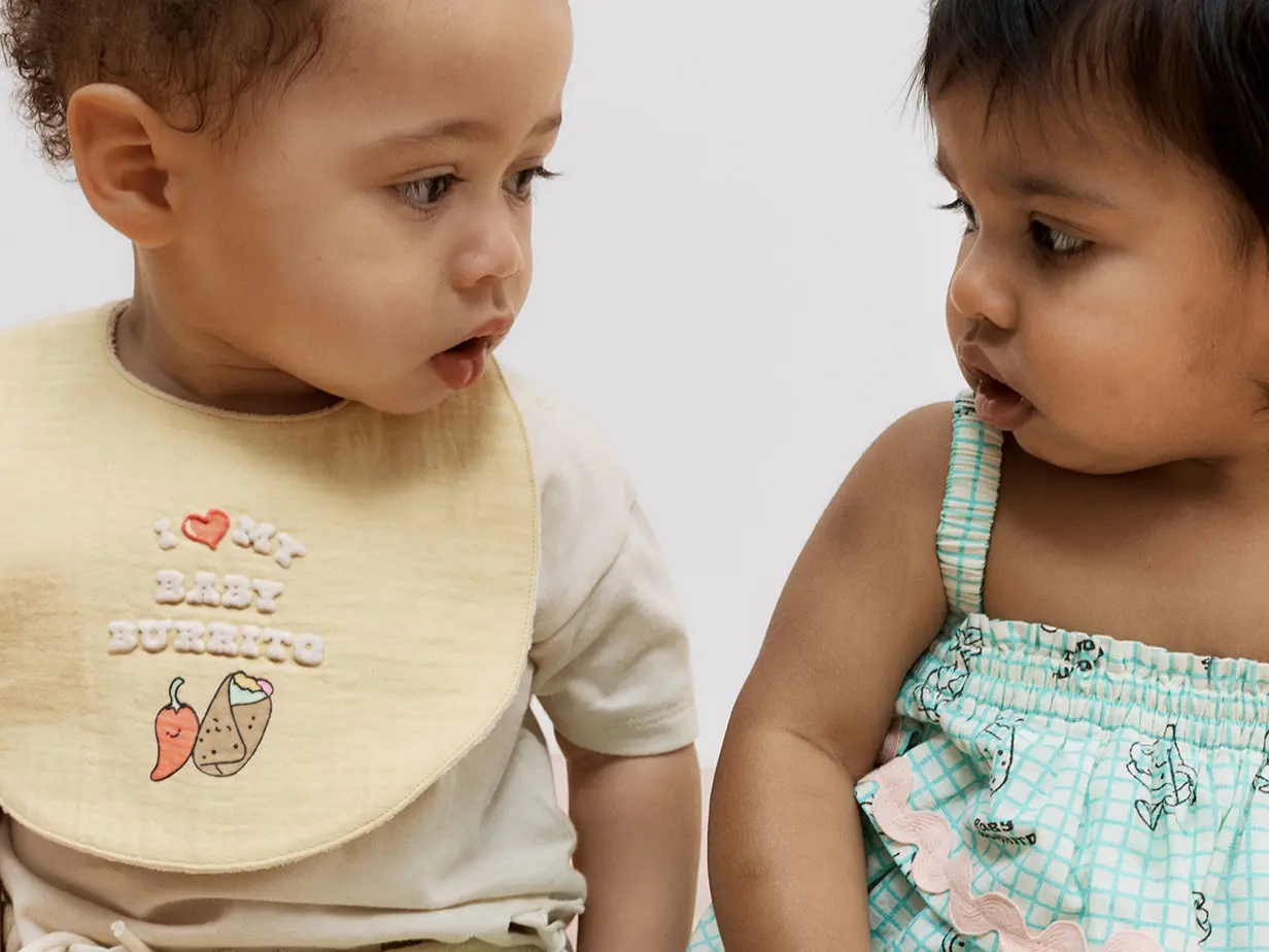 Two toddlers in summer clothes