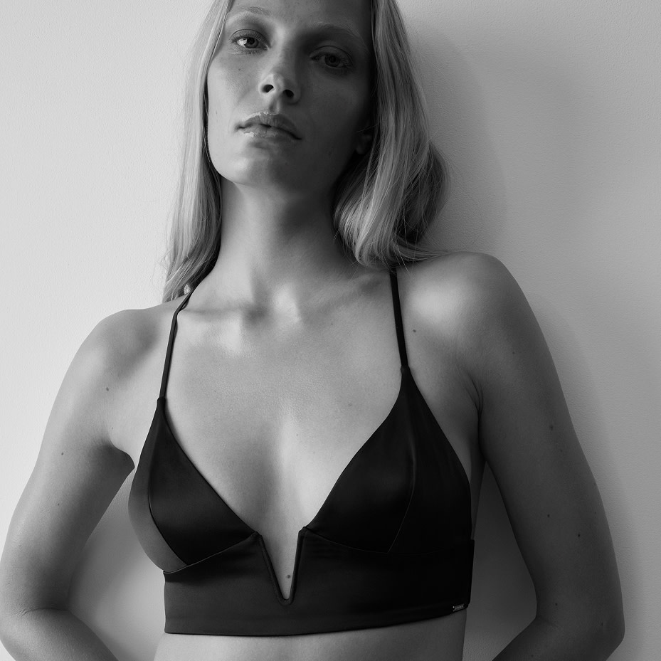 Woman wearing black bra