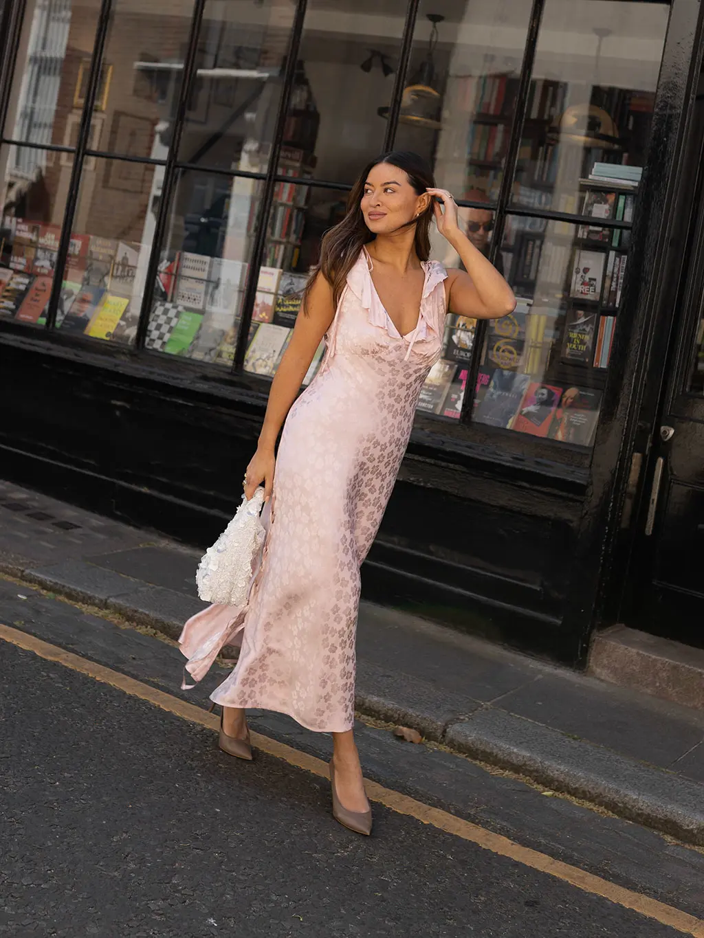 Woman in pink satin dress