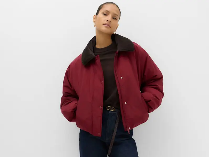 Woman in red puffer coat