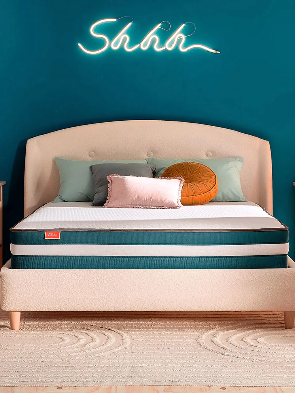 Mattress against blue wall