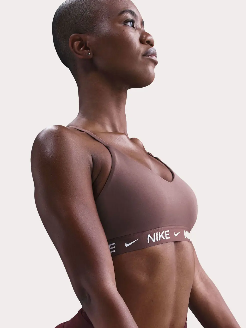 Woman wearing brown sports bra