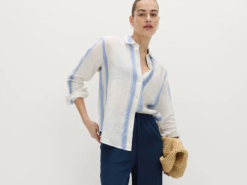 Woman in linen shirt and trousers