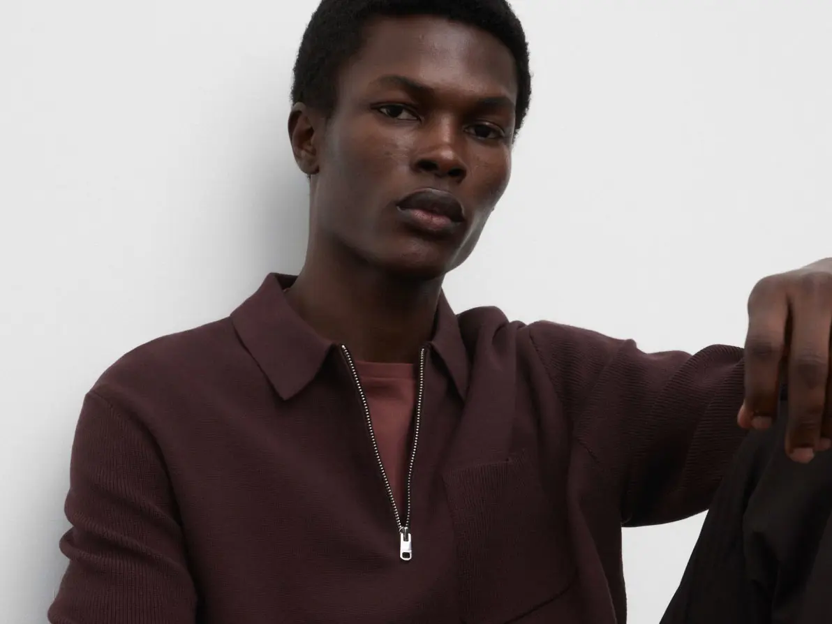 Man wearing chocolate brown half-zip knit