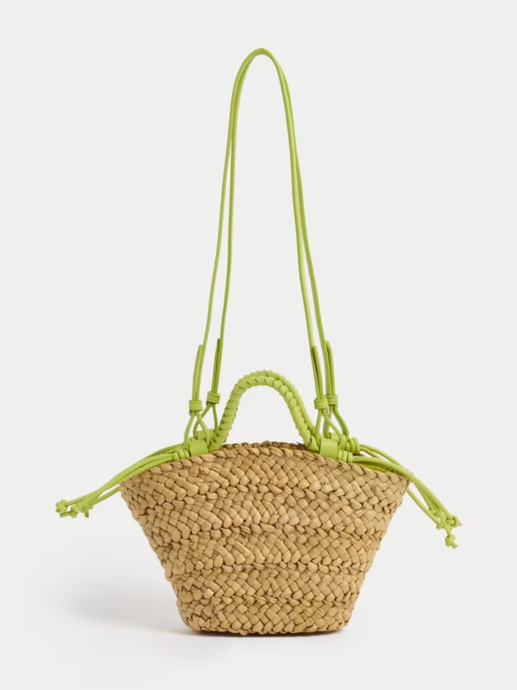 A cutout of a lime and straw mini bag