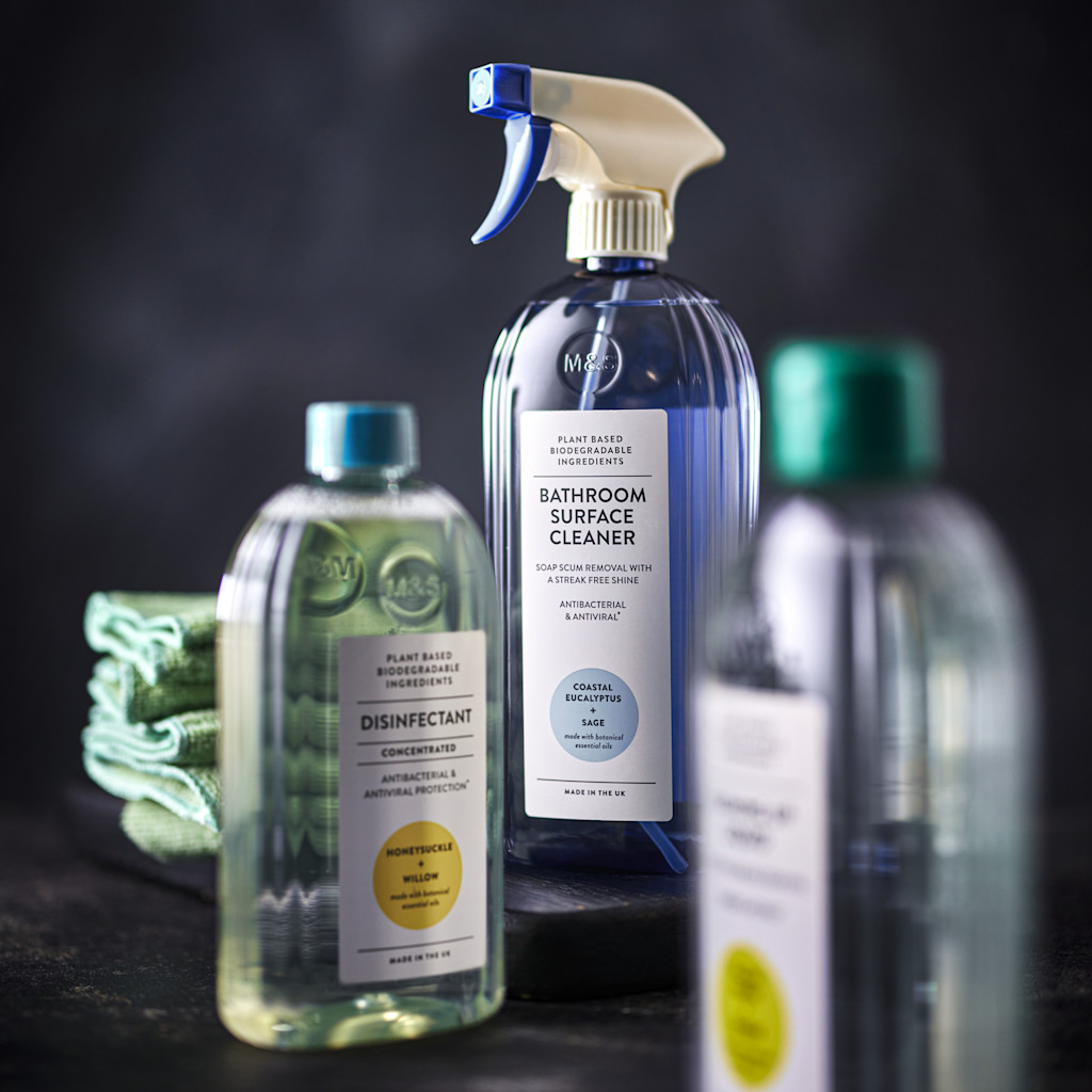 Cleaning products on black background