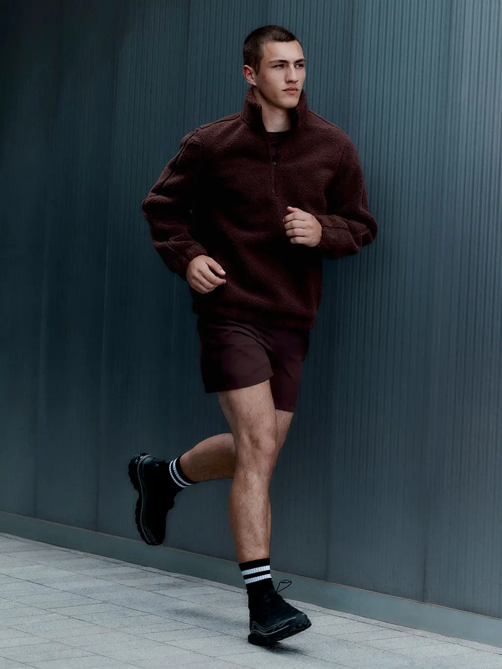Man running in black trainers