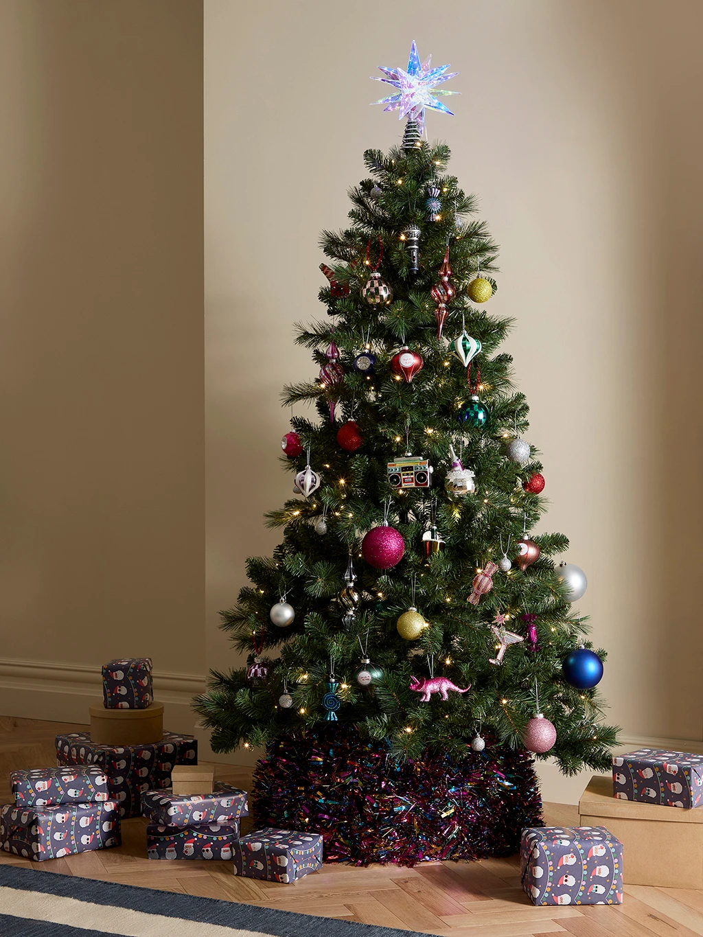 Pine-shaped Christmas tree with colourful decorations