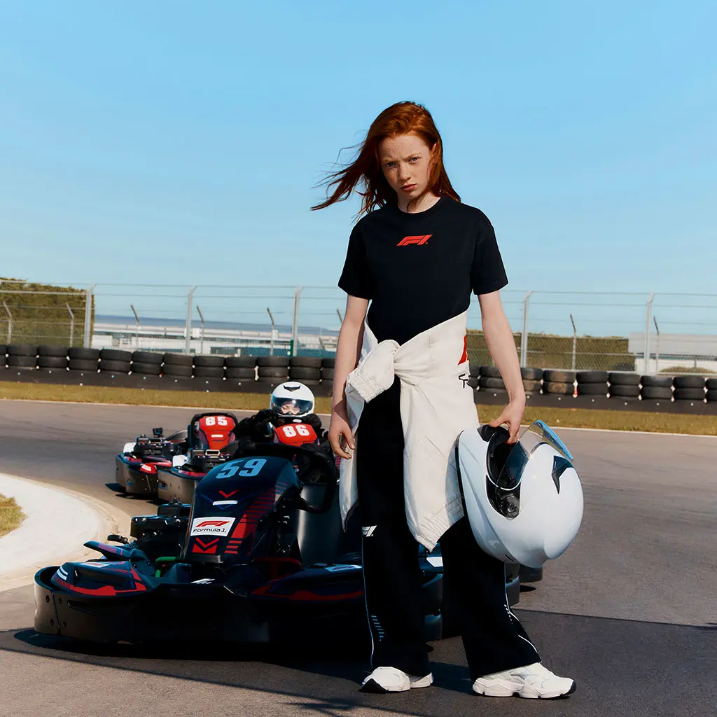 Girl standing on race track
