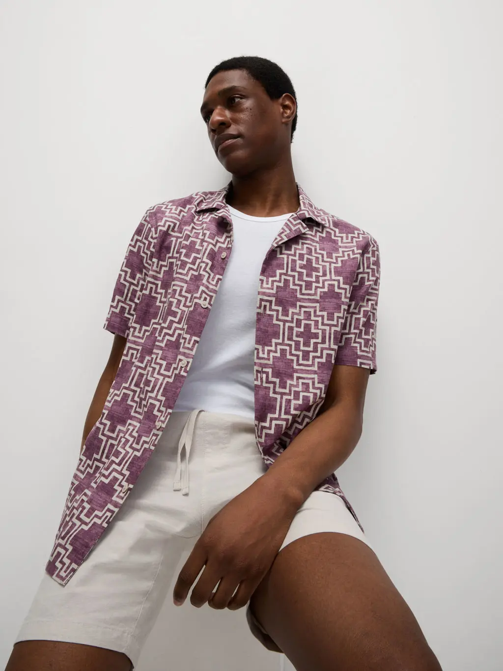 Man wearing a geometric print shirt