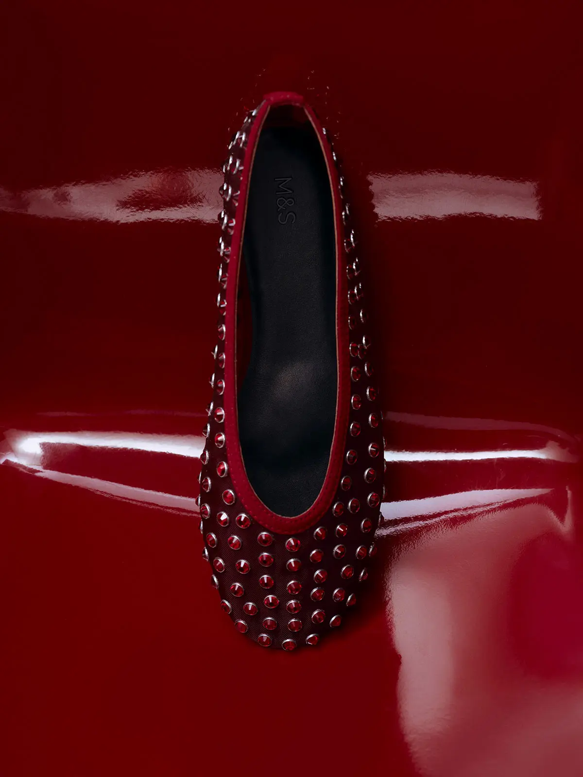 Red embellished flat shoe