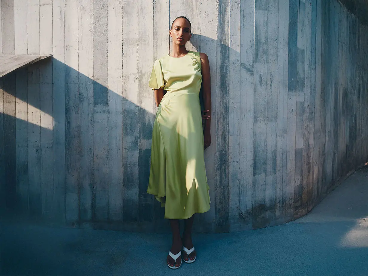 Woman wearing green dress