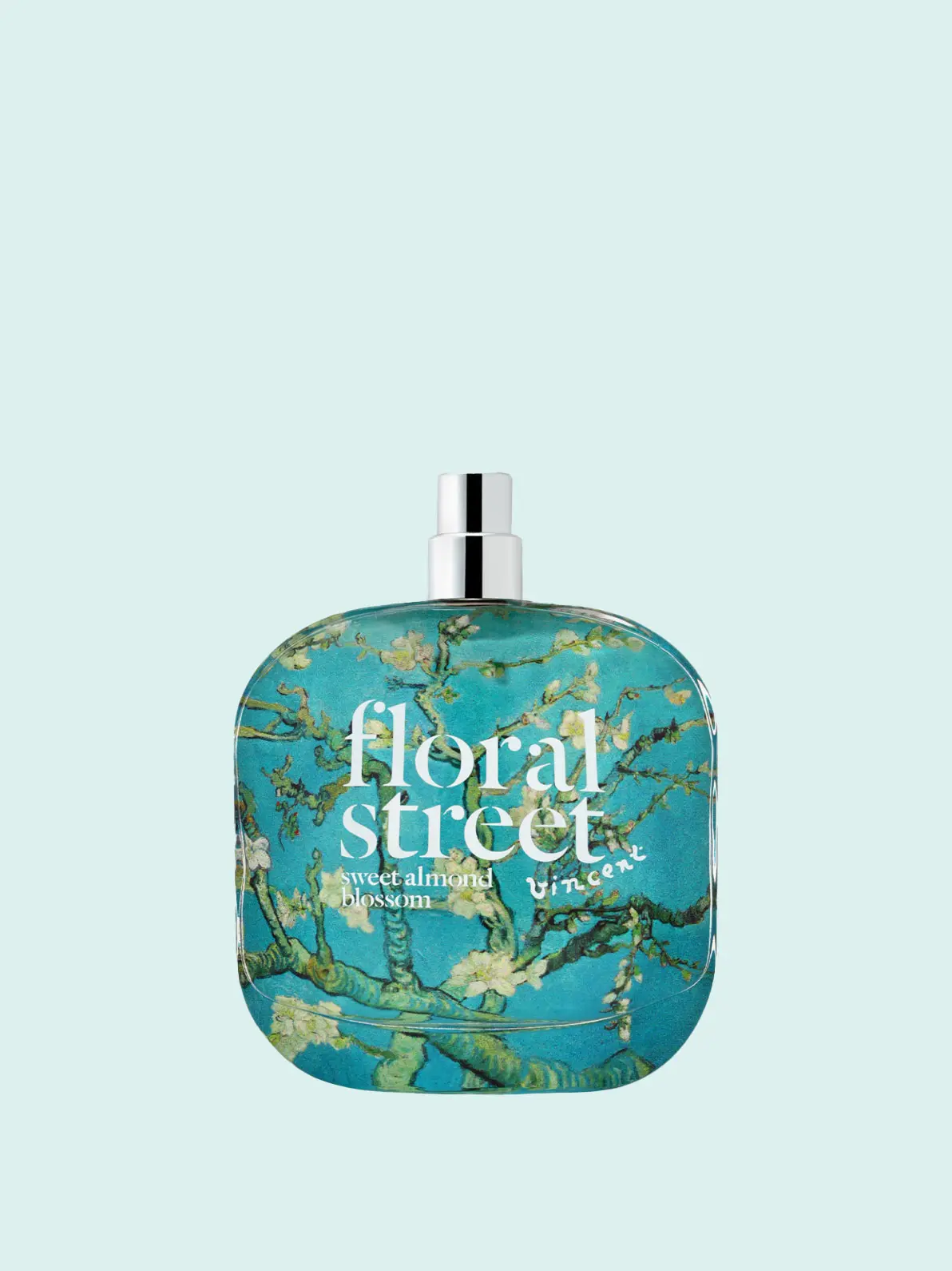 Bottle of perfume in blue floral design