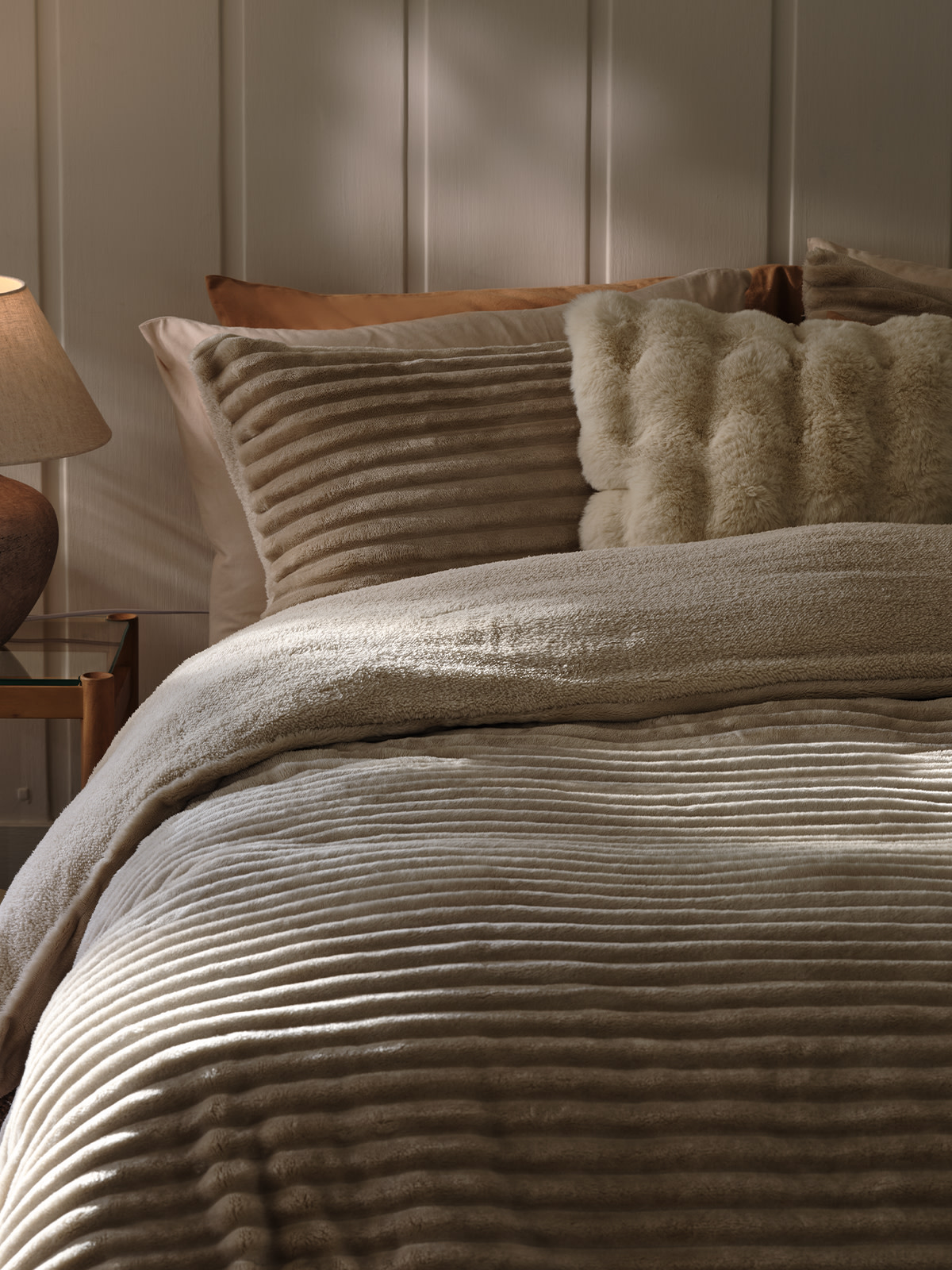 Bed with cosy bedding