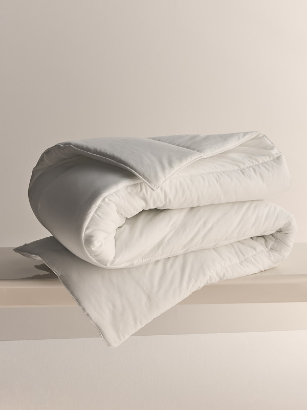 Duvet folded on shelf