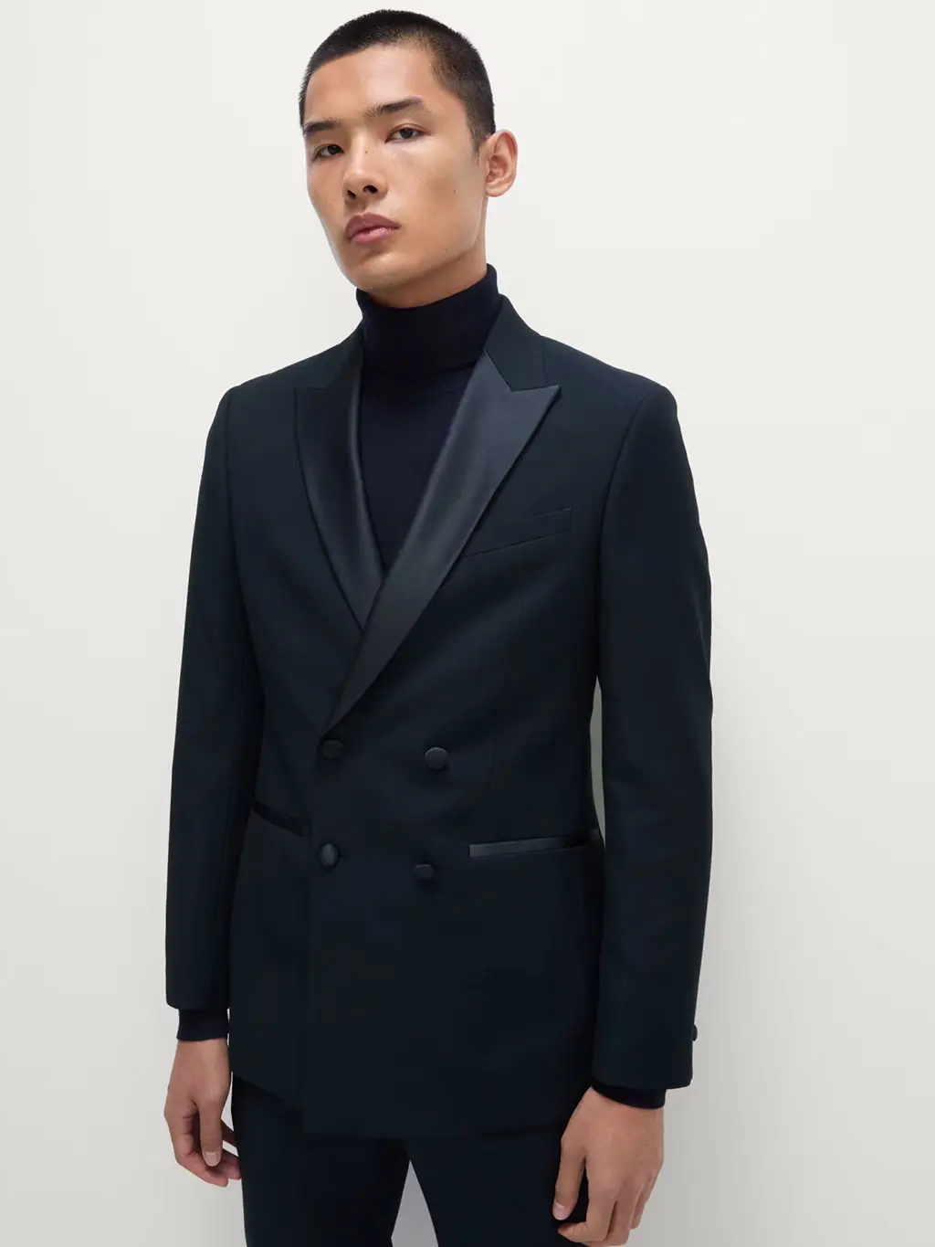 Man in black double-breasted tux