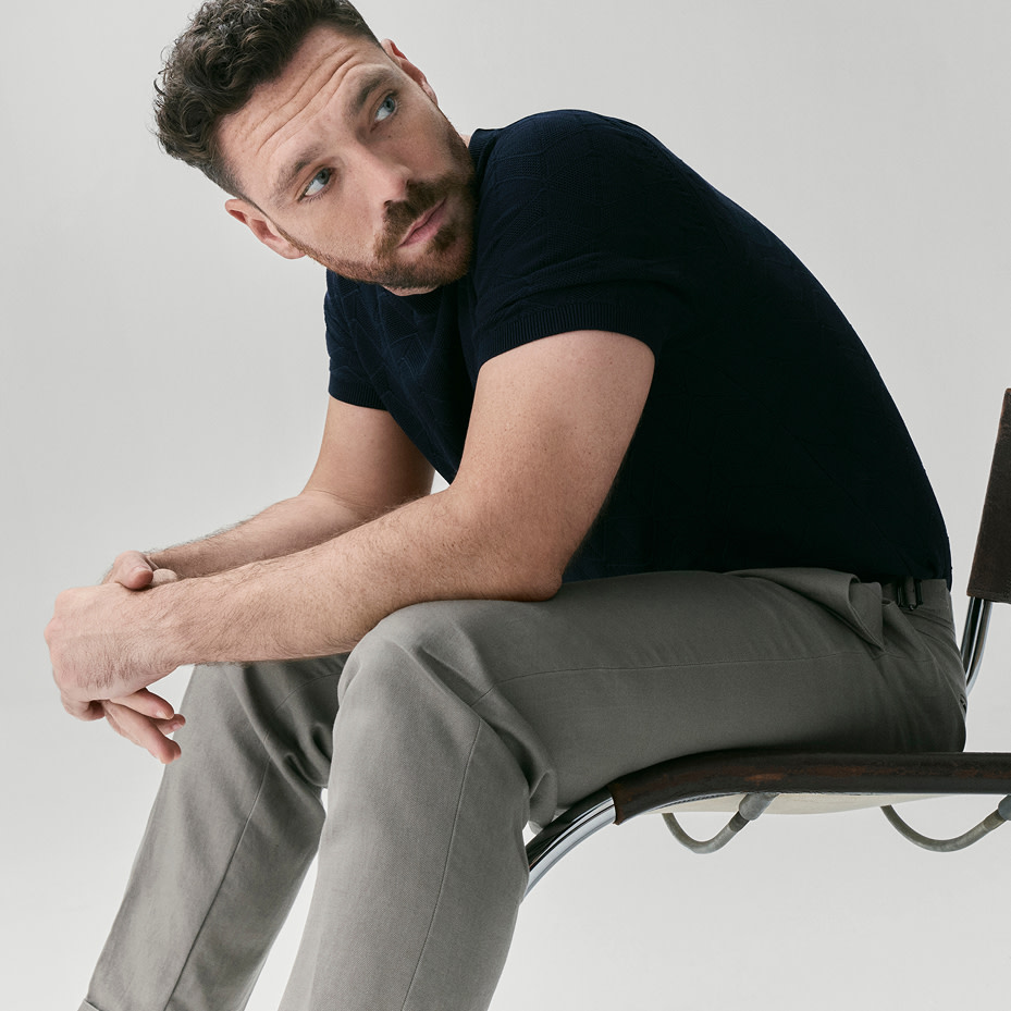 Man wearing olive green trousers