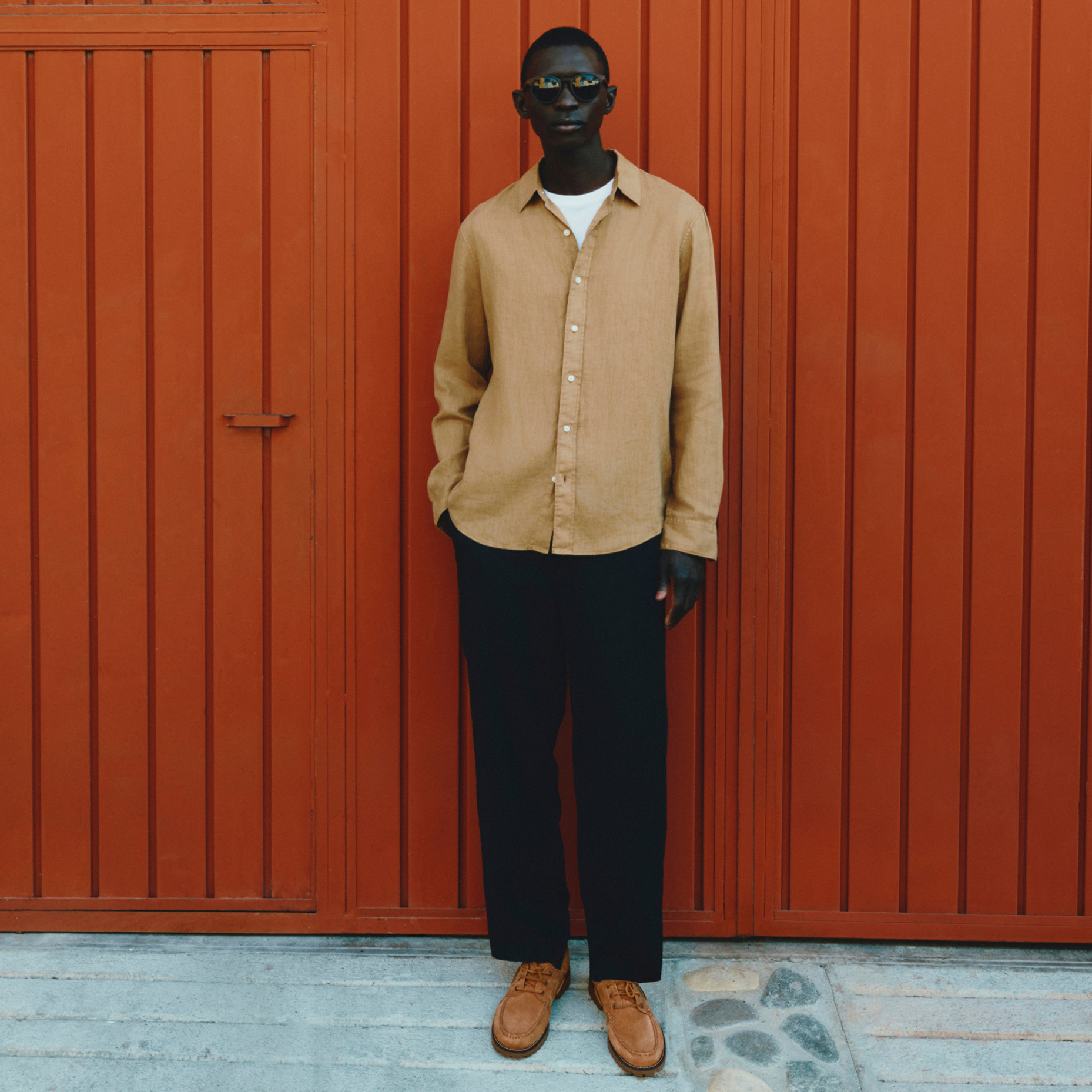 Man wearing brown casual shirt