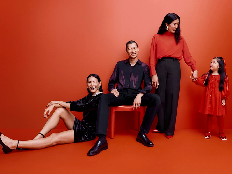 Family wearing red outfits to celebrate Lunar New Year