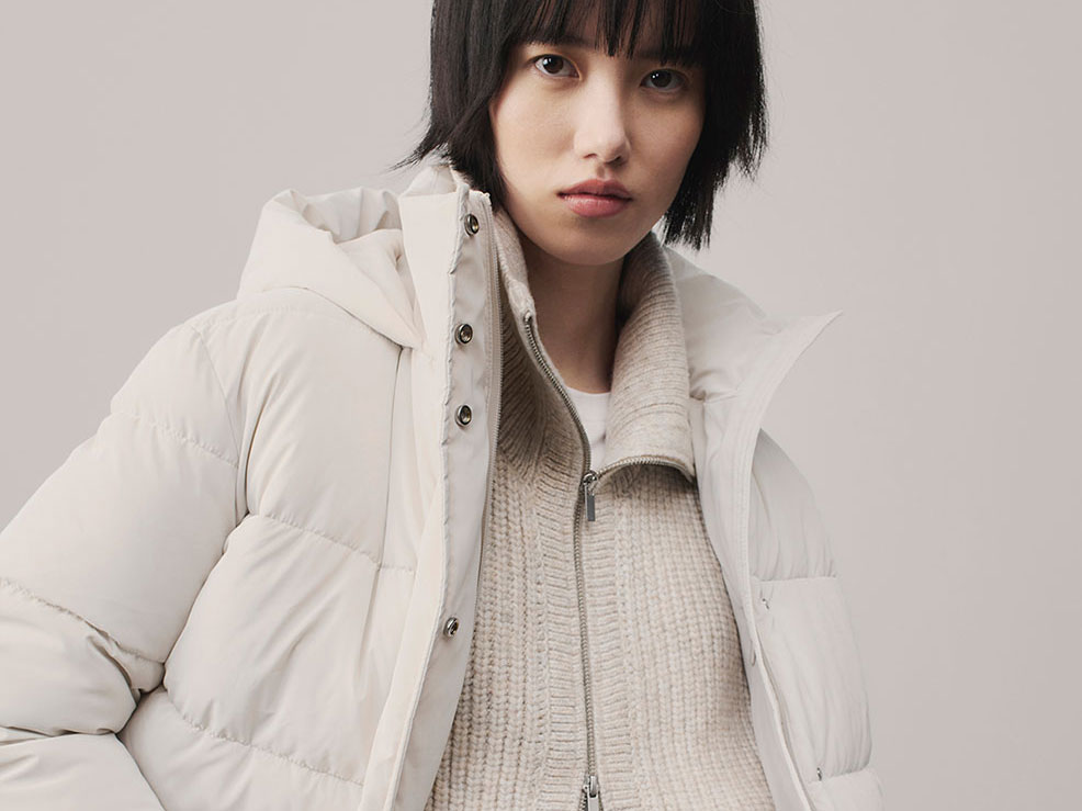 Woman wearing white puffer jacket